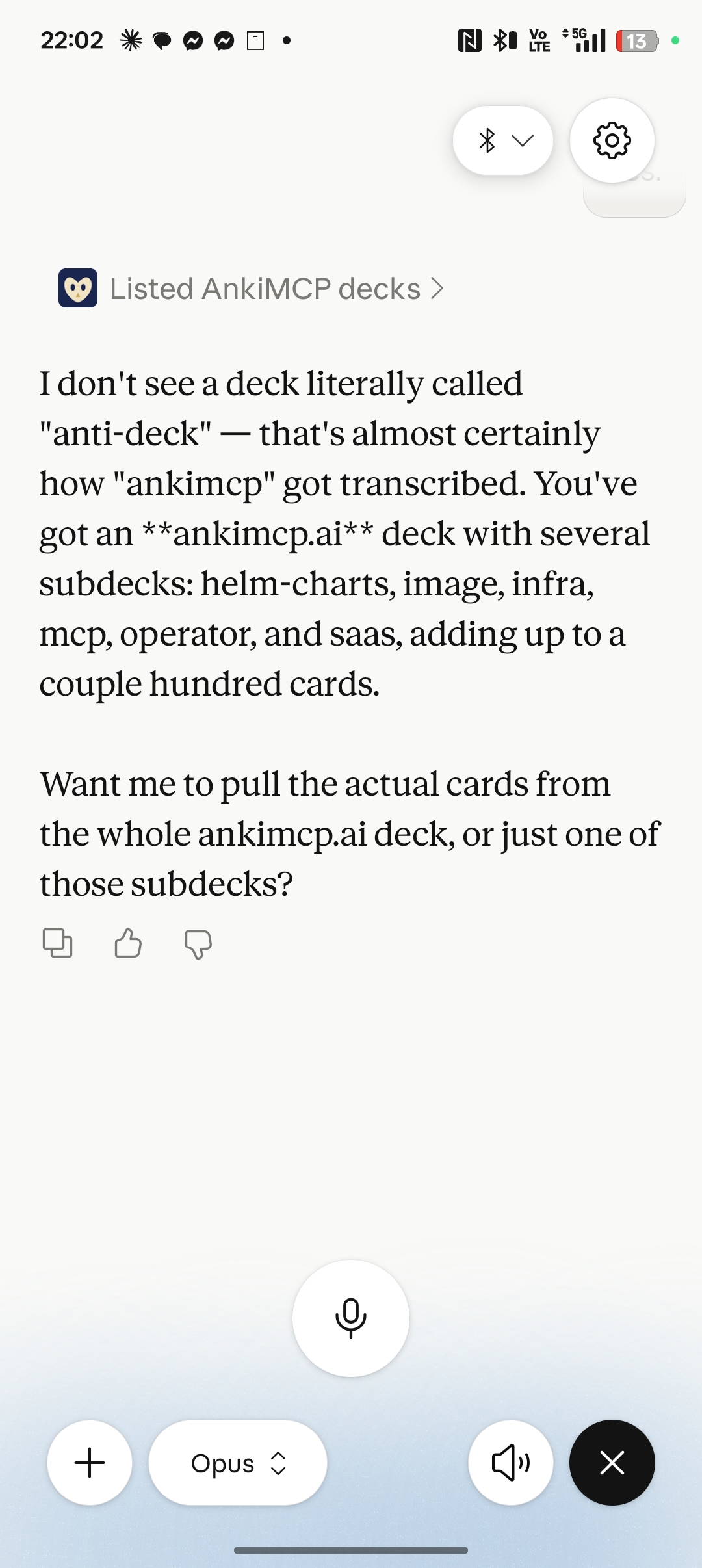 Claude voice mode on a phone: a collapsed 'Listed AnkiMCP decks' tool call, then Claude's reply naming the user's ankimcp.ai deck and its subdecks and offering to pull the cards.